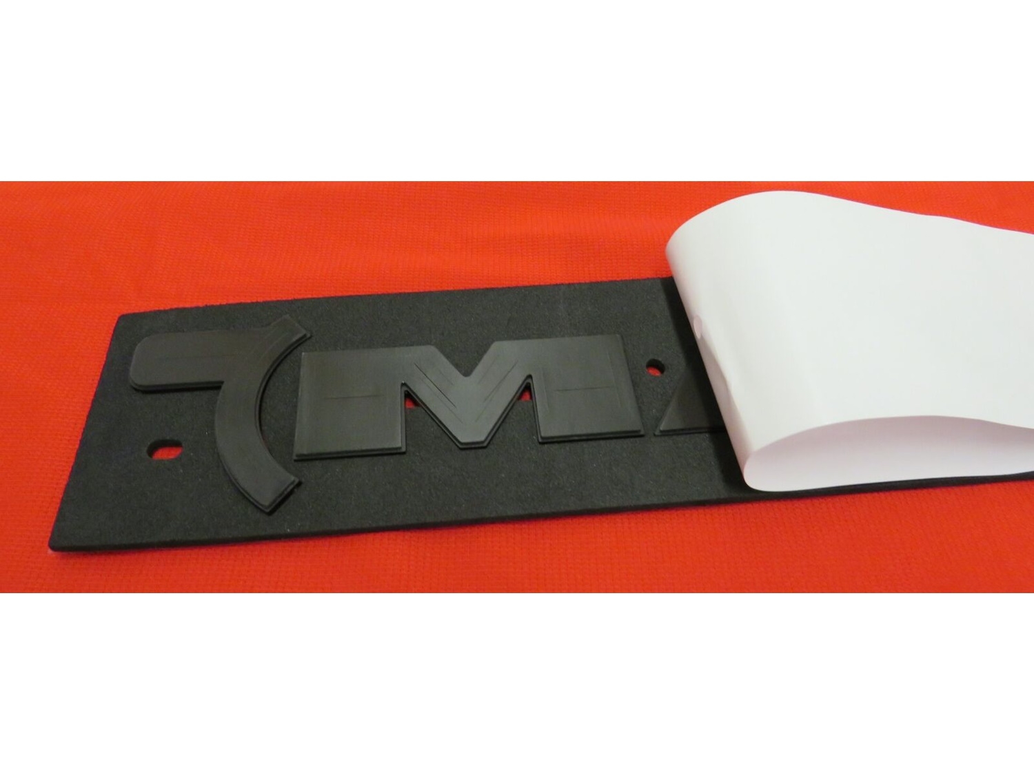 Mopar Red Edition RAM Door Badge In Red, 68568439AA | Mopar Online