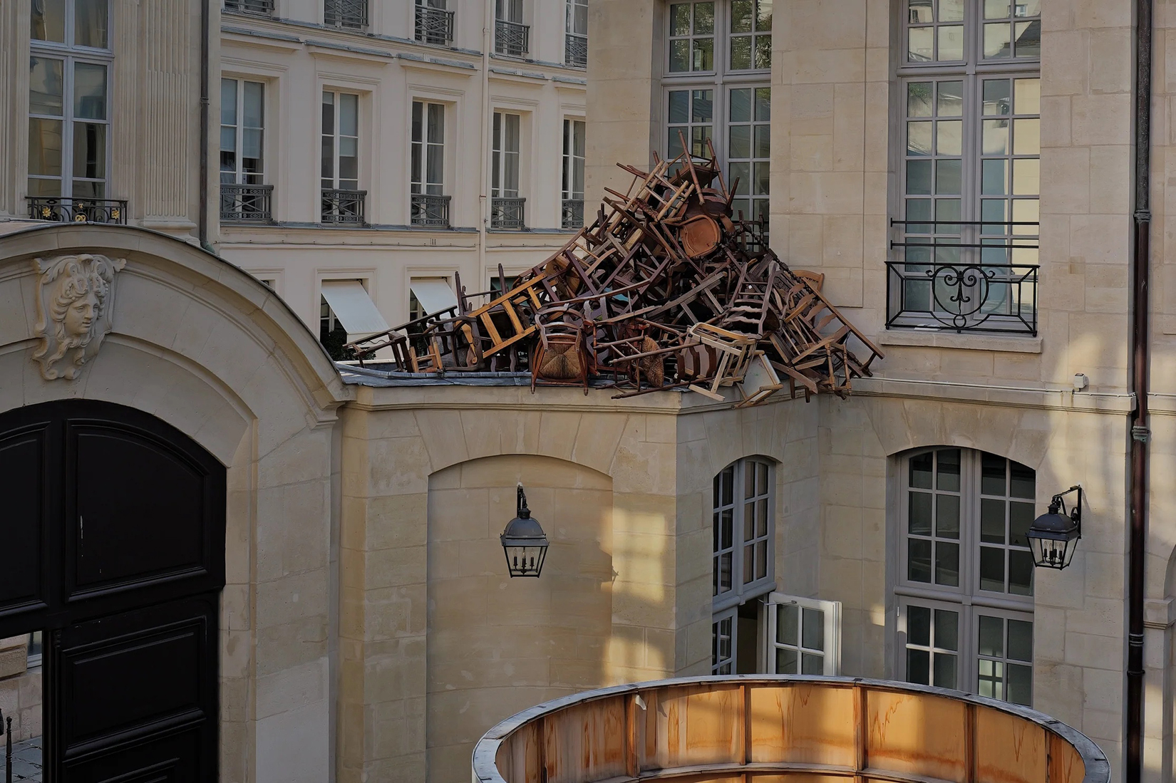 An avalanche of chairs surges through the courtyard of Dover