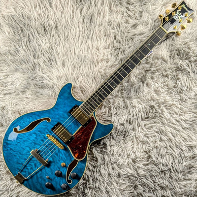 Ibanez AMH90QM TBL Translucent Blue electric guitar with gig bag