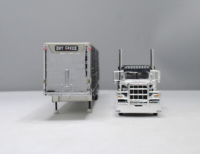 DCP 1/64 Dry Creek Black White Tri-Axle Peterbilt 389 Wilson