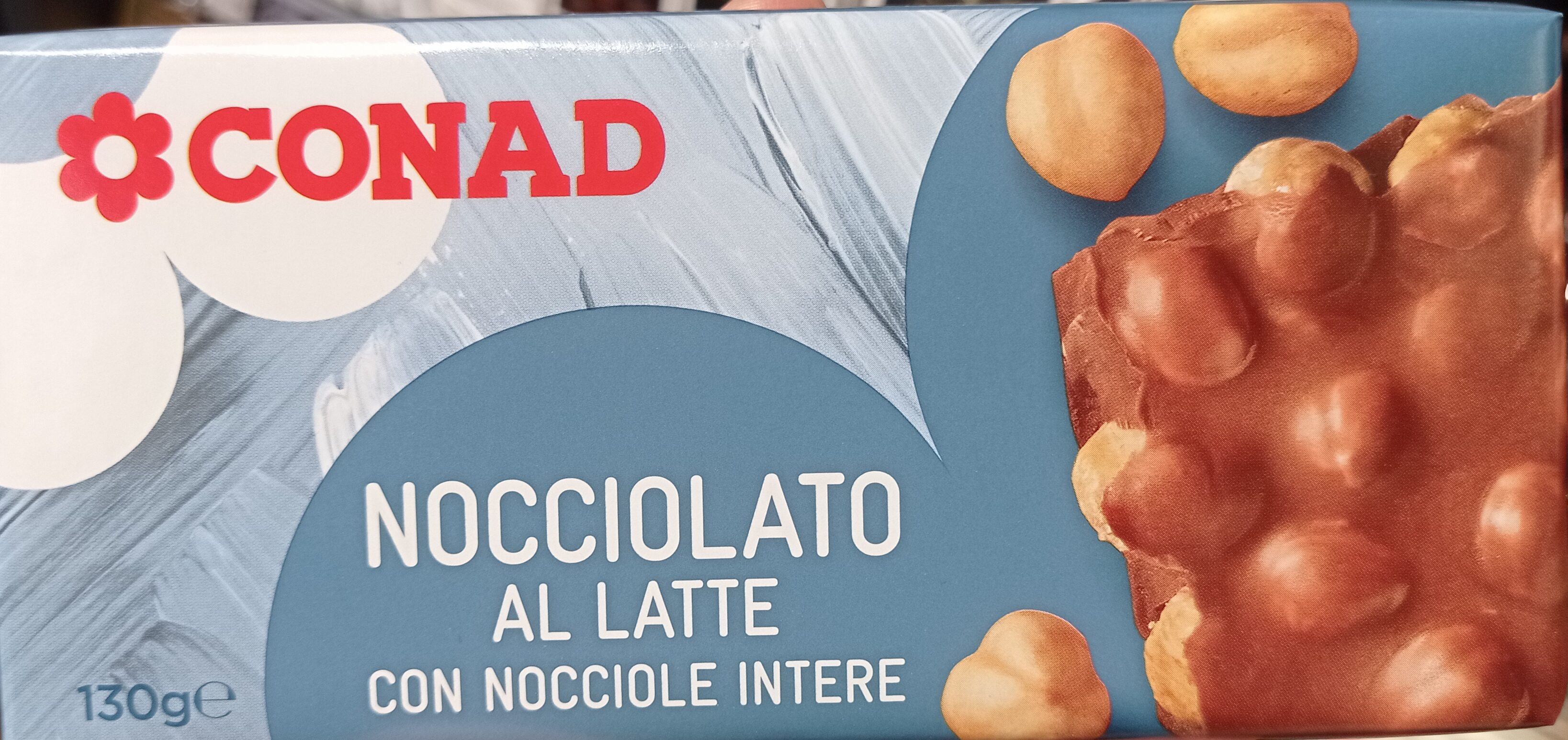 Cioccolato al latte con nocciole – Conad – 130 g